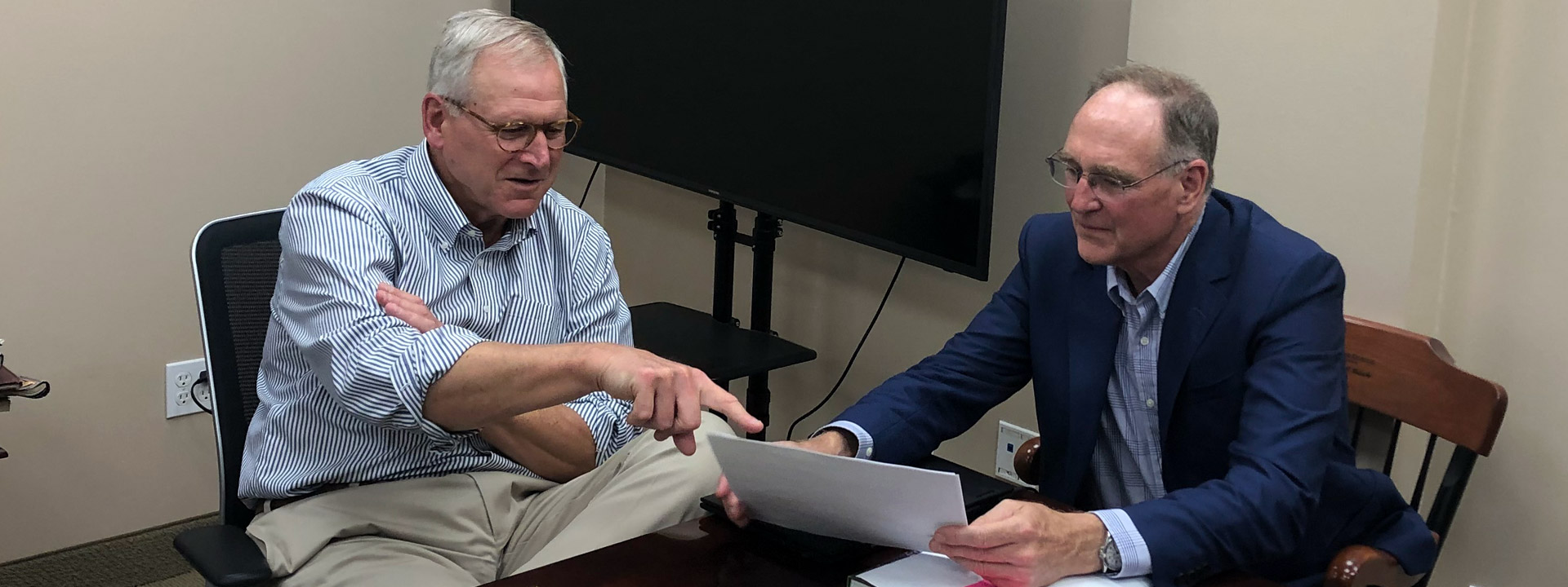 St. Edward High School (Lakewood, Ohio) President Jim Kubacki discussing new school startup recommendations with Columbia Boys School President Brian Burby